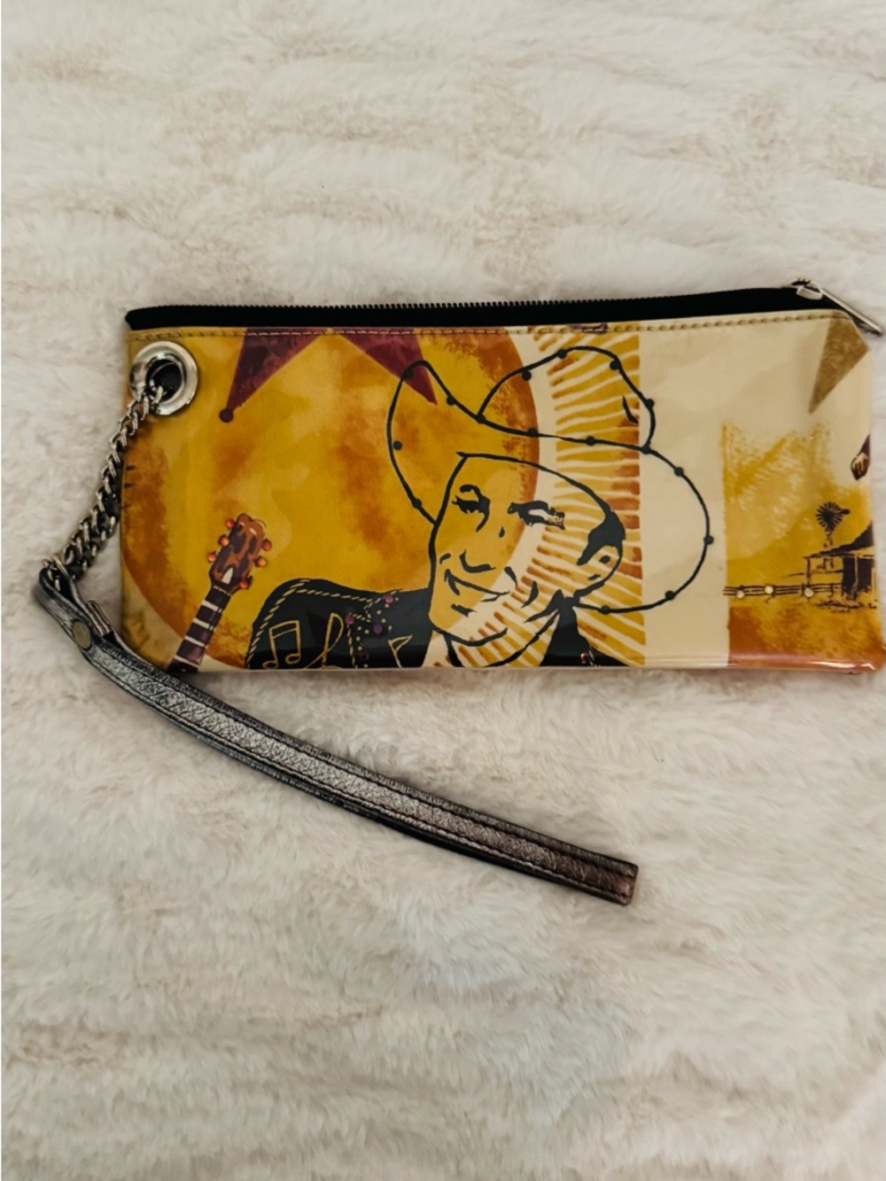 M. Andonia Graphic Cowboy Wristlet Clutch in Yellow and Cream